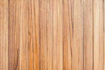 Fototapeta premium Above view of brown panel wooden texture background. Old striped wood lumber wall. Vintage board floor natural pattern. The surface of the table plank teak. Top view