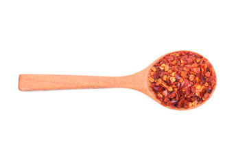 Paprika powder in the wooden spoon isolated on white background.With clipping path.