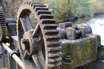 Old rusty gear from a weir