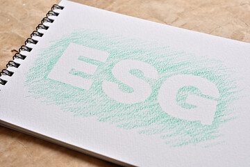 There is a sketchbook with the word 