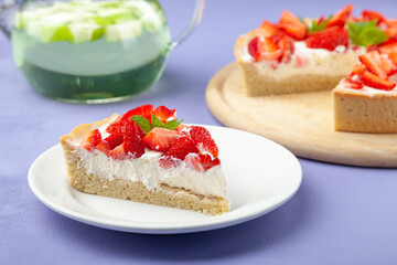 Homemade peach cheesecake, berry tea cup, piece of pie