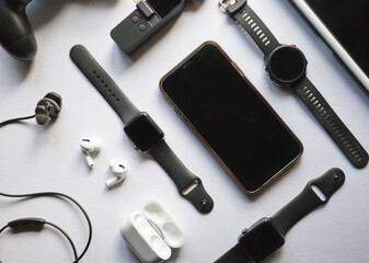 Flat lay shot of devices on white background