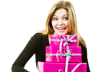 Happy surprised woman with many gifts