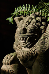 The Bali lion statue on black background