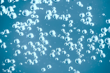 air bubbles in water macro background / blue background abstract bubbles in water