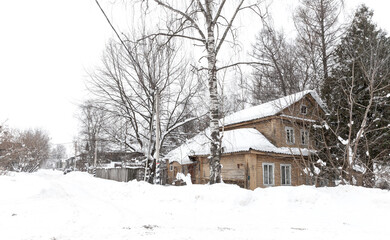 Russian village at snowy winter day. Tikhvin