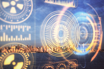 Double exposure of technology theme hologram and cityscape background. Concept of Hightech.