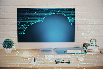 Double exposure of table with computer on background and data theme hologram. Data technology concept.