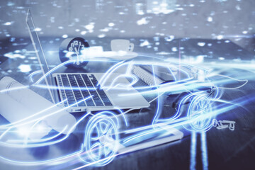 Desktop computer background in office with automobile hologram drawing. Multi exposure. Tech concept.