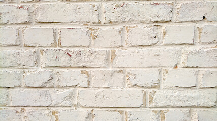 mur en briques blanc vétuste