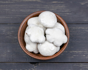 Gingerbread covered with icing on a wooden table