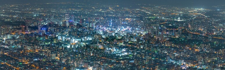 Fototapeta na wymiar パノラマ撮影 藻岩山から望む札幌市の夜景 / 北海道札幌市の観光イメージ
