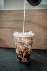 ice latte coffee in plastic glass