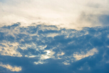 Fototapeta premium Panorama of dark, grey and white rain clouds in bright sunlight in autumn, Almere, Flevoland, The Netherlands, October 23, 2020