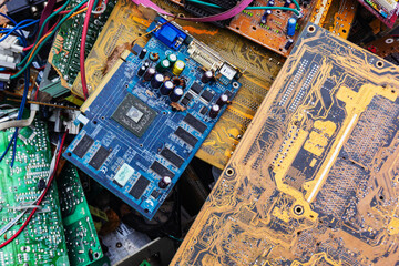 Obraz premium Old computer chip, garbage disposal in a junkyard.