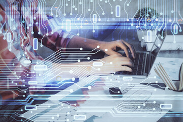 Double exposure of technology hologram with man working on computer background. Concept of big data.