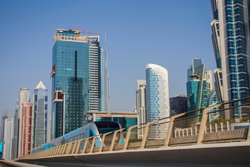 Skyscrapers in district of Dubai city known as Business Bay.Dubai metro train also can be seen in the foreground. UAE.