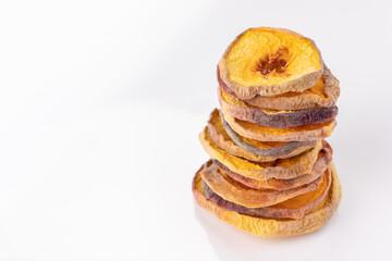 slices of dried peach on a white background. dried fruits. eco. macro.