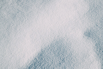 Natural White Snowy Background. Snow Surface. Winter Abstract Background. Top View