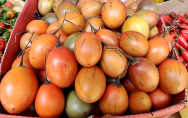 Tamarillo or tree tomato,  It is best known as the species that bears the tamarillo, an egg-shaped edible fruit.