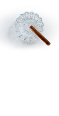 close up view of nice robusto Cuban cigar and ashtray on white back. banner