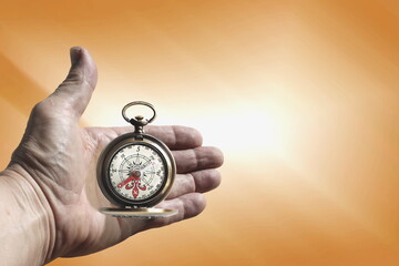 round compass in hand on abstract background as symbol of tourism with compass, travel with compass...