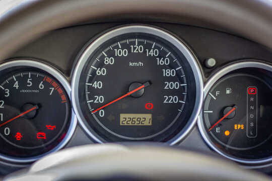 Car​ dashboard​ modern​ automobile control​ illuminated panel​ speed display.
