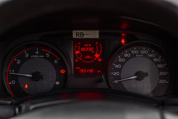 Car​ dashboard​ modern​ automobile control​ illuminated panel​ speed display.