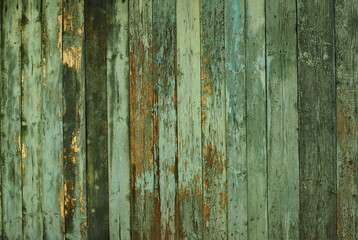 Wooden natural background with art processing. Fragment of old wooden wall cladding.