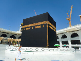MECCA, SAUDI ARABIA , OCTOBER 22, 2020 - The Holy Kaaba - Pilgrims return to Mecca for limited umrah as  coronavirus restrictions - face mask wearing Muslims perform umrah  in Makka © Ayman