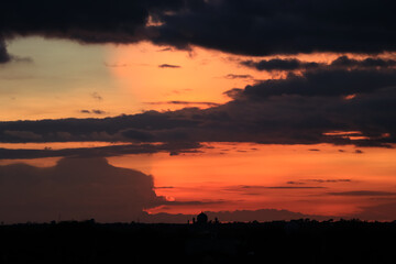 Obraz premium Evening sky colors gold orange red dark 