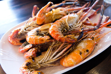cooked shrimp on a plate. Seafood grill shrimp completed so delicious, Thai seafood