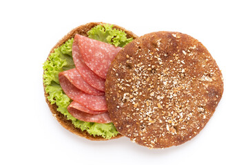 Sandwich with salami sausage on white background.