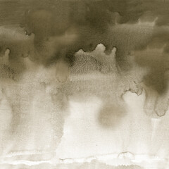 Naklejka premium A dirty smudge spread across brown paper on a white background .Texture or background