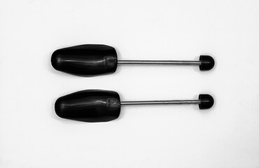plastic black shoetree on white background