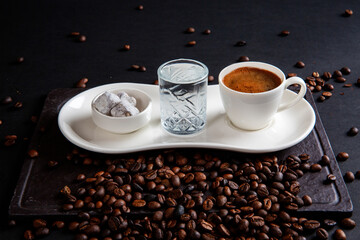 front view Turkish coffee and coffee beans on isolated black background