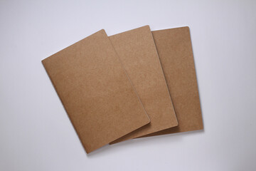 yellow ocher blank books on white background