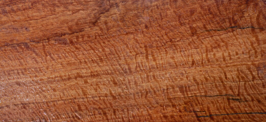 Burma padauk wood has tiger stripe or curly stripe grain