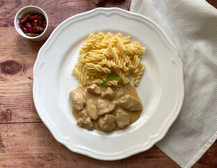Tender strips of turkey in creamy sour creme sauce with fusilli pasta.
