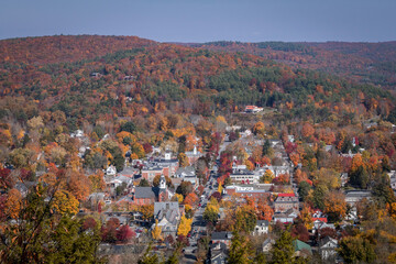 Overlooking small town Milford, PA, from scenic overlook on a sunny fall day - obrazy, fototapety, plakaty