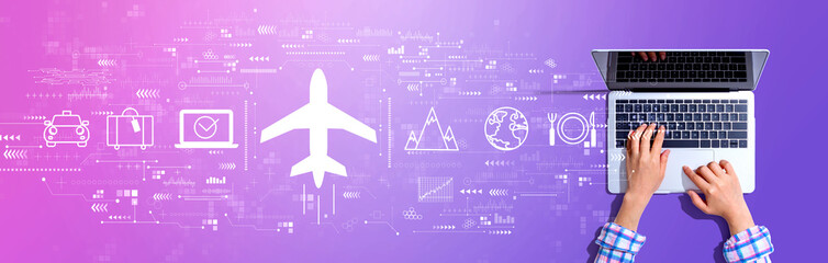 Obraz na płótnie Canvas Flight ticket booking concept with woman using a laptop computer