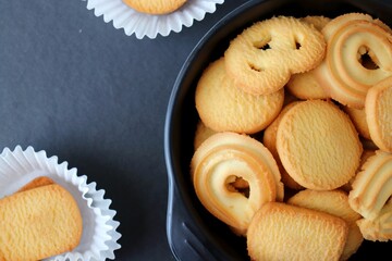 An overhead or flat lay view of Danish butter chocolate cookies in the traditional tin box. ideal for Valentine's day/Raksha Bandhan/Diwali/Christmas gift. with copy space