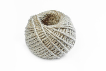 Close-up rope ball isolated on white background. Brown clew