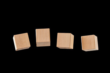 Four cubes floating in the air isolated on a black background, layout for Your design.