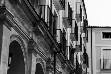 View of an old house facade with balconies and arches in Alcoi.
