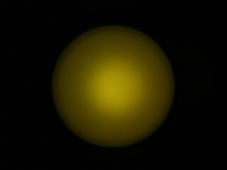 yellow lamp in the shape of a sphere