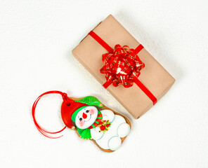 
Christmas gingerbread snowman and gift box.