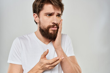 emotional bearded man close-up facial expression studio lifestyle
