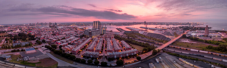 Aerial sunrise panorama of Locust point on the Chesapeake in Baltimore with colorful sky
