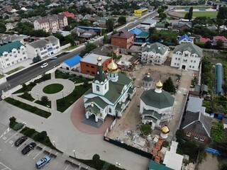 Christian temple in the center of the village from above